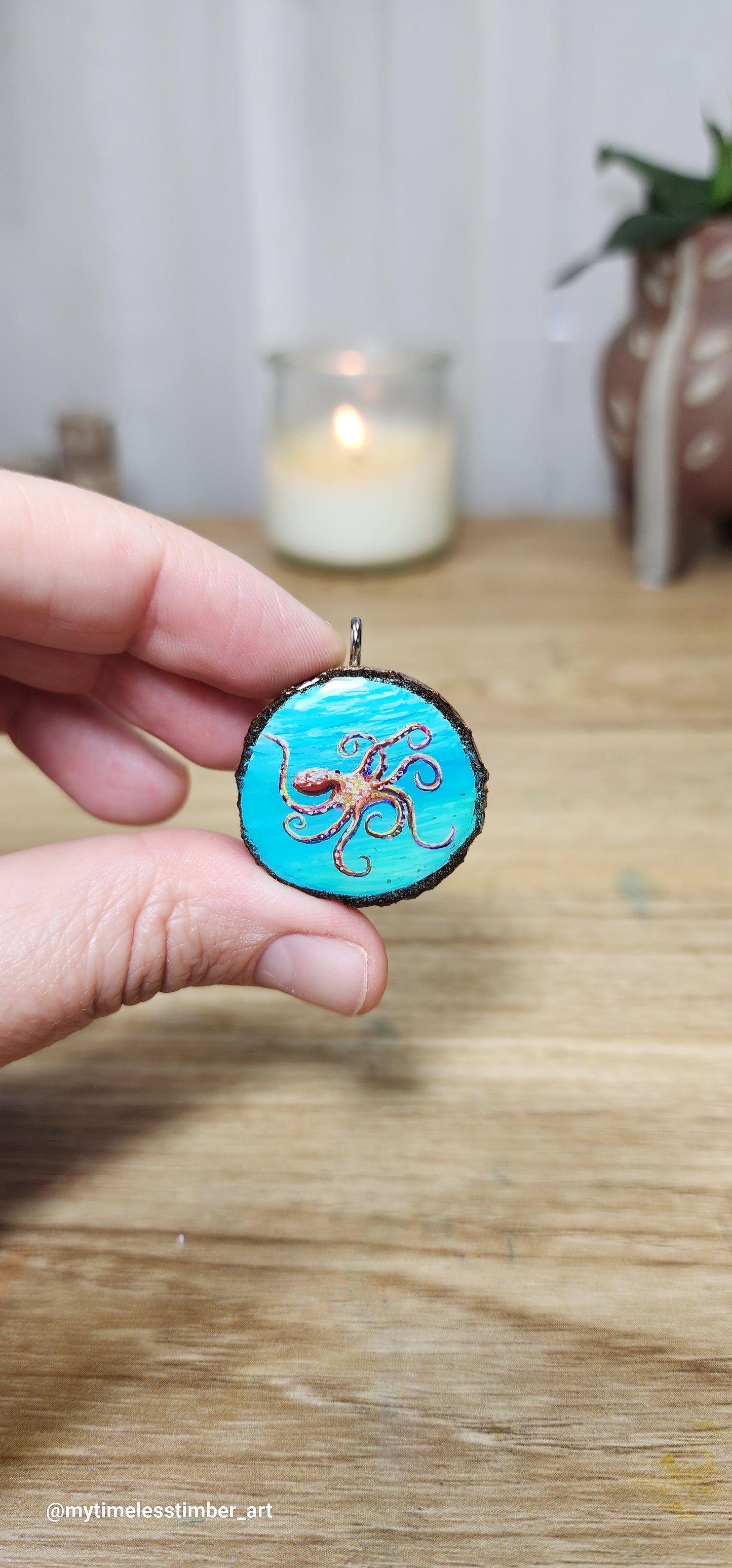 "Octopus Drifts in Teal Waters"