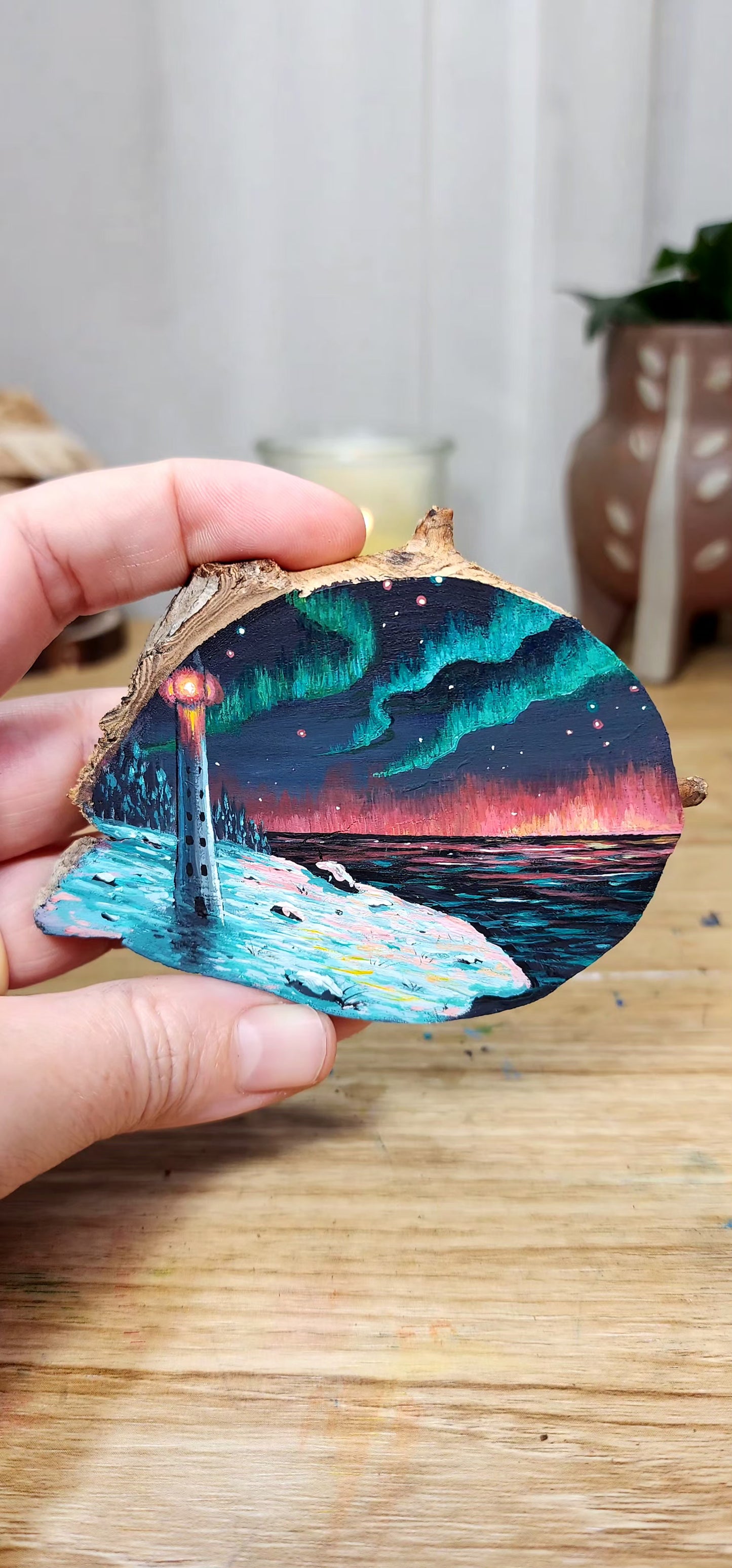 "Lighthouse Under Northern Lights"